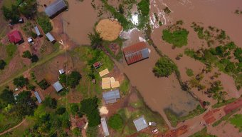 The images show the flood extent in Uganda 