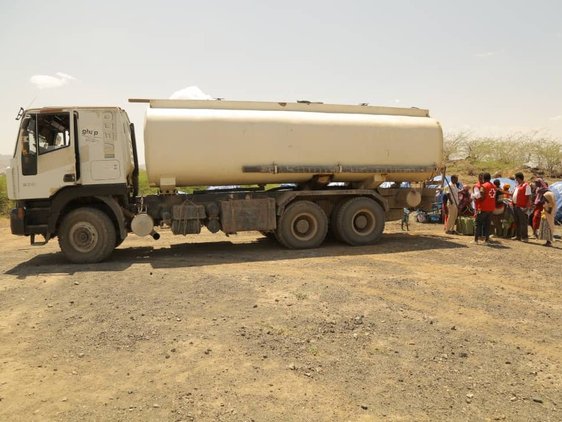 This image shows the trucking and distribution of clean water